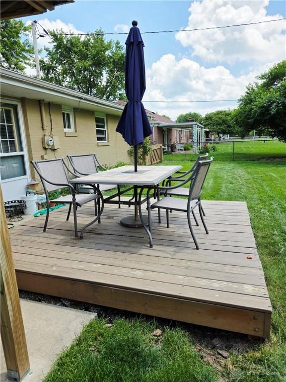 1008 Terracewood Dr, Englewood, OH 45322 - deck featuring a lawn and outdoor dining area