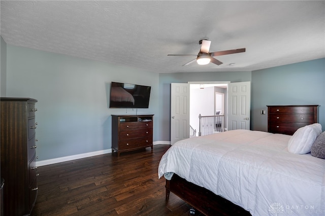 4037 Andora Blvd, Amelia, OH 45102 - bedroom featuring baseboards, dark wood-style flooring, and ceiling fan