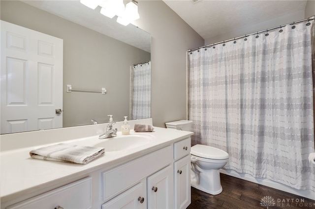 4037 Andora Blvd, Amelia, OH 45102 - bathroom featuring toilet, vanity, wood finished floors, and a shower with curtain