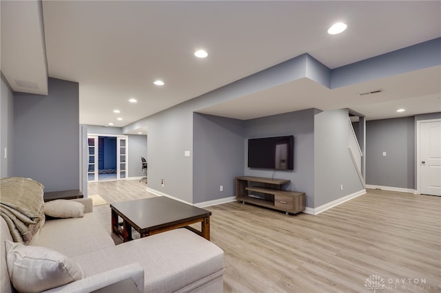 4037 Andora Blvd, Amelia, OH 45102 - living room featuring light wood-type flooring, baseboards, recessed lighting, and stairway