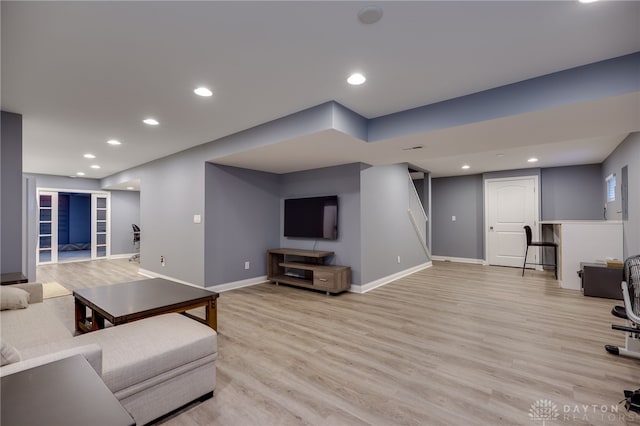 4037 Andora Blvd, Amelia, OH 45102 - living room with stairway, light wood-style flooring, baseboards, and recessed lighting