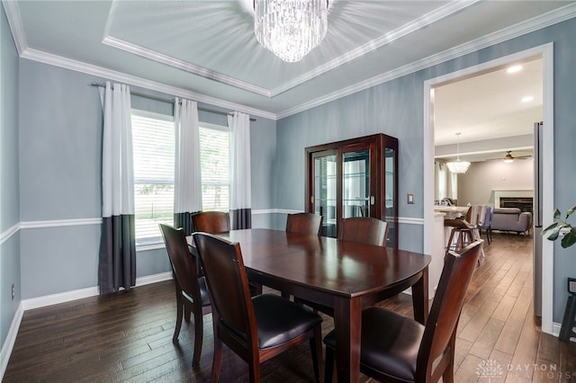 4037 Andora Blvd, Amelia, OH 45102 - dining area featuring a chandelier, dark wood-style flooring, baseboards, and ornamental molding
