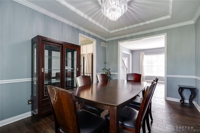 4037 Andora Blvd, Amelia, OH 45102 - dining space with a chandelier, dark wood-style flooring, baseboards, and ornamental molding