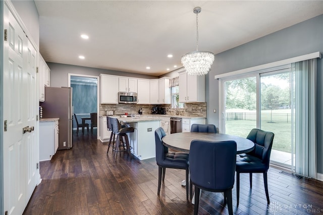 4037 Andora Blvd, Amelia, OH 45102 - dining area with a chandelier, dark wood-style floors, and recessed lighting