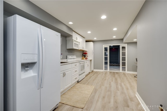 4037 Andora Blvd, Amelia, OH 45102 - kitchen featuring white appliances, light wood finished floors, white cabinetry, light countertops, and recessed lighting