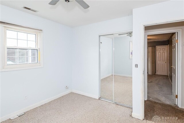 520 Buttercup Ave, Vandalia, OH 45377 - unfurnished bedroom with carpet flooring, a closet, and ceiling fan
