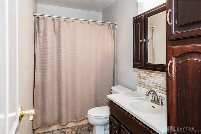 520 Buttercup Ave, Vandalia, OH 45377 - bathroom featuring tasteful backsplash, vanity, and shower / bath combo with shower curtain