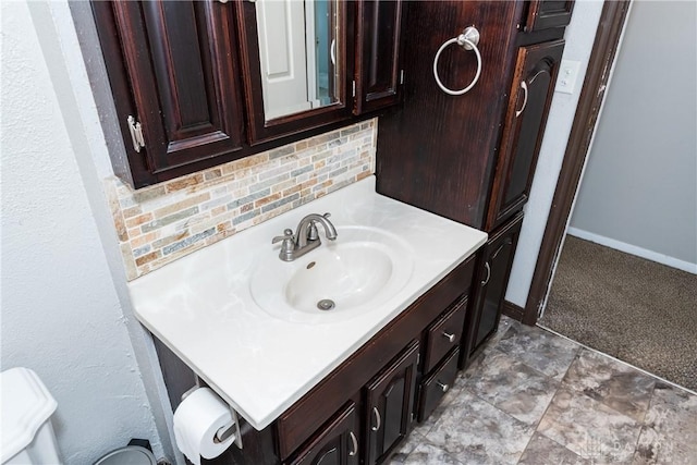 520 Buttercup Ave, Vandalia, OH 45377 - bathroom featuring vanity and backsplash