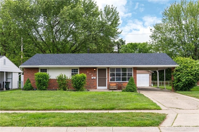 520 Buttercup Ave, Vandalia, OH 45377 - ranch-style house featuring brick siding, a front yard, a garage, and roof with shingles