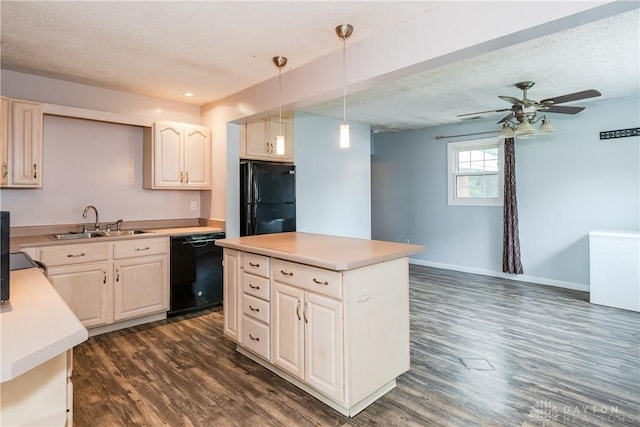 520 Buttercup Ave, Vandalia, OH 45377 - kitchen with black appliances, dark wood-style floors, a ceiling fan, pendant lighting, and a textured ceiling