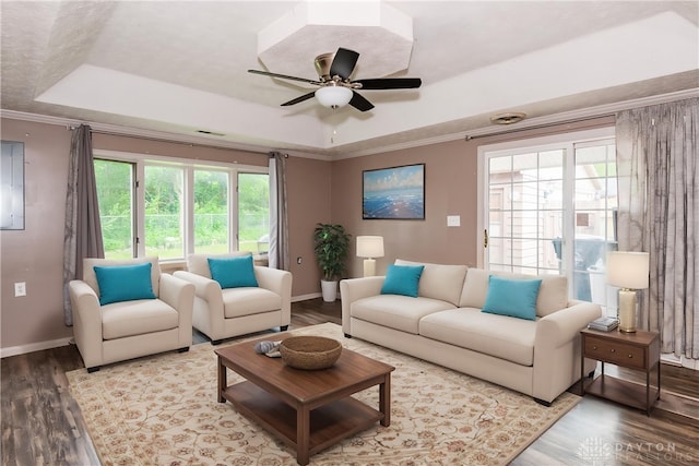 520 Buttercup Ave, Vandalia, OH 45377 - living area featuring a raised ceiling, wood finished floors, a ceiling fan, and ornamental molding