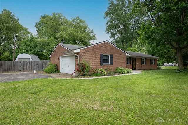 1172 Bay Ln, Beavercreek, OH 45430 - ranch-style home with driveway, a garage, and brick siding