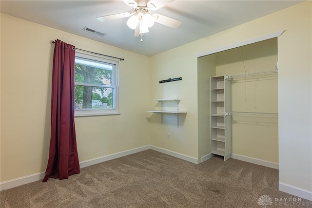 1172 Bay Ln, Beavercreek, OH 45430 - unfurnished bedroom with carpet, a closet, baseboards, and a ceiling fan