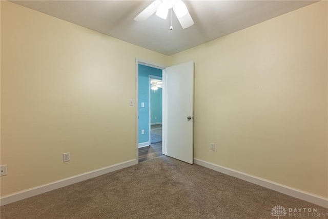 1172 Bay Ln, Beavercreek, OH 45430 - spare room featuring ceiling fan, carpet floors, and baseboards