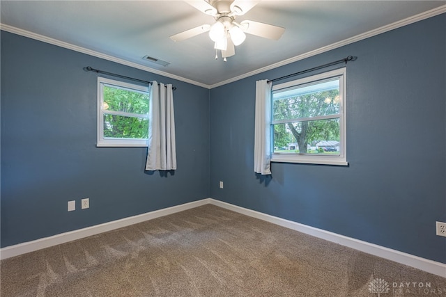 1172 Bay Ln, Beavercreek, OH 45430 - carpeted spare room featuring plenty of natural light, baseboards, crown molding, and a ceiling fan