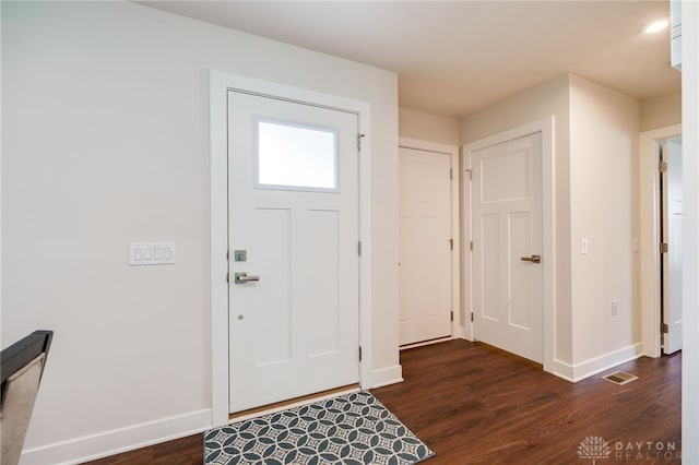6709 Crystal Harbour Dr, Middletown, OH 45042 - entryway with dark wood-style flooring and baseboards