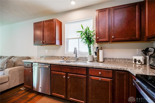 6709 Crystal Harbour Dr, Middletown, OH 45042 - kitchen featuring stainless steel dishwasher, a sink, dark wood finished floors, open floor plan, and light stone countertops