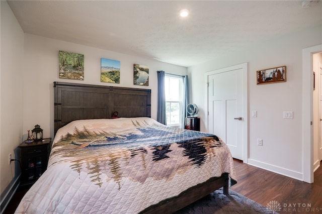 6709 Crystal Harbour Dr, Middletown, OH 45042 - bedroom with dark wood-type flooring, baseboards, and recessed lighting