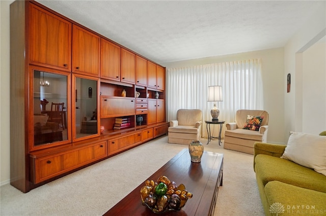 348 Cambridge Dr, Fairborn, OH 45324 - living room featuring light colored carpet and a textured ceiling