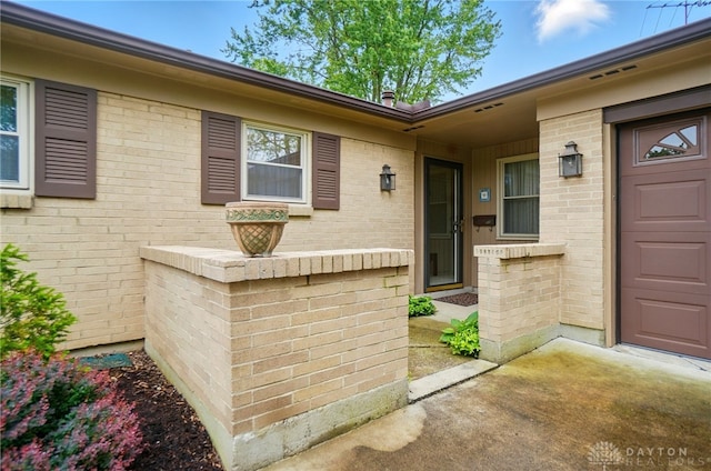 348 Cambridge Dr, Fairborn, OH 45324 - view of exterior entry with brick siding