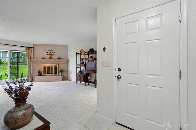 348 Cambridge Dr, Fairborn, OH 45324 - carpeted living area featuring a brick fireplace