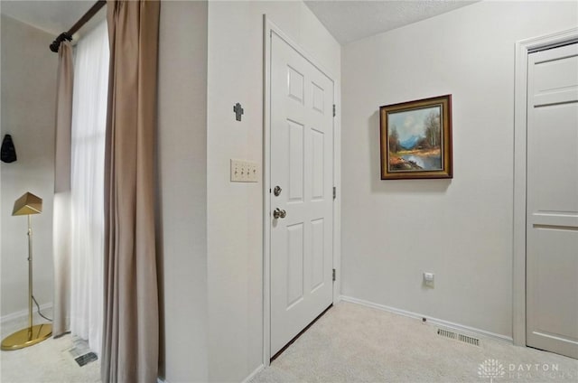 348 Cambridge Dr, Fairborn, OH 45324 - corridor featuring baseboards and carpet flooring