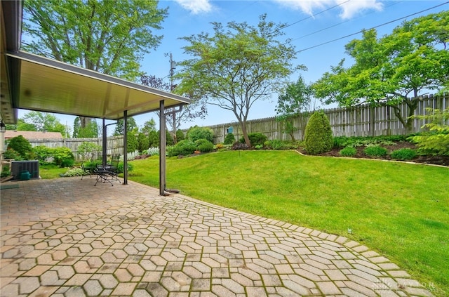 348 Cambridge Dr, Fairborn, OH 45324 - view of patio featuring central AC