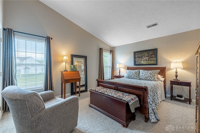 989 Brooke Ln, Xenia, OH 45385 - bedroom featuring carpet flooring, a textured ceiling, baseboards, and high vaulted ceiling