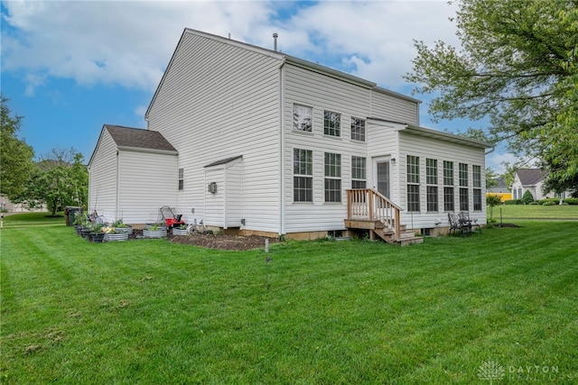 989 Brooke Ln, Xenia, OH 45385 - rear view of property with a yard and entry steps