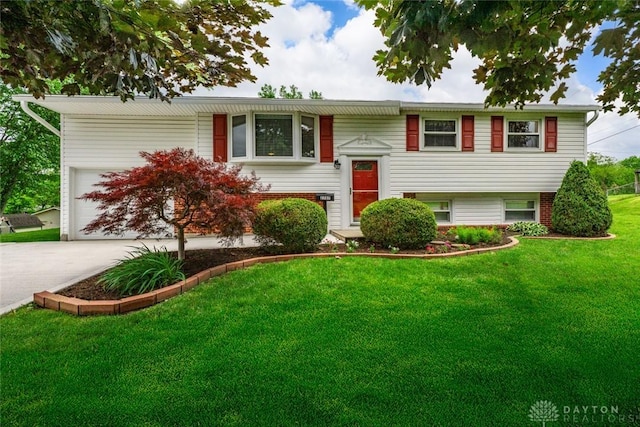 2707 Rockledge Trl, Beavercreek, OH 45430 - bi-level home with a garage, a front yard, and driveway