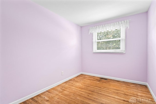 2707 Rockledge Trl, Beavercreek, OH 45430 - empty room with baseboards and light wood-style flooring