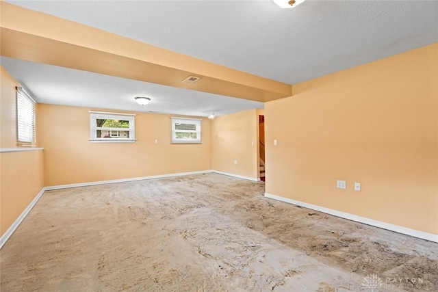2707 Rockledge Trl, Beavercreek, OH 45430 - empty room featuring healthy amount of natural light, baseboards, and stairs