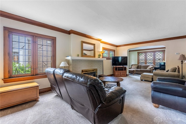 54 Beverly Pl, Oakwood, OH 45419 - living room with light colored carpet, ornamental molding, and a brick fireplace