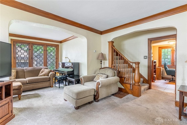54 Beverly Pl, Oakwood, OH 45419 - living area with arched walkways, carpet, crown molding, and stairs