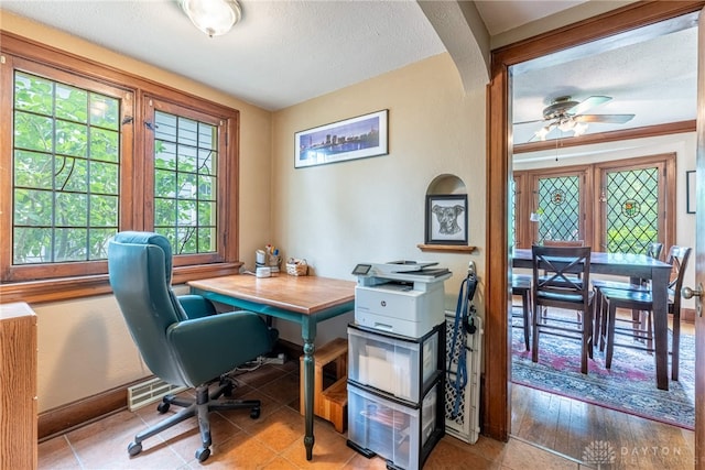 54 Beverly Pl, Oakwood, OH 45419 - office area featuring a textured ceiling, ceiling fan, and baseboards