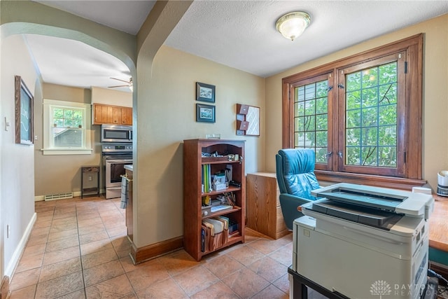 54 Beverly Pl, Oakwood, OH 45419 - office with baseboards, a ceiling fan, and arched walkways