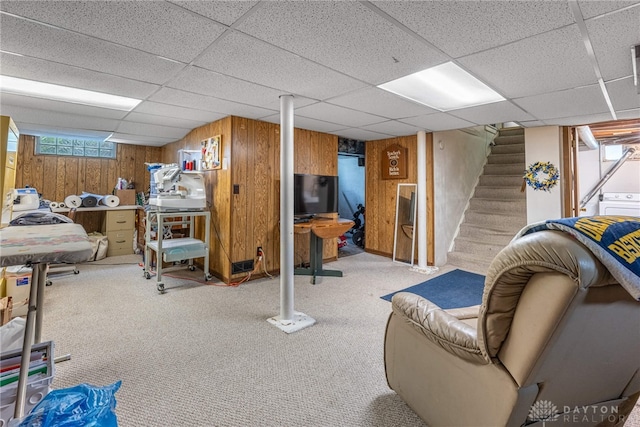 54 Beverly Pl, Oakwood, OH 45419 - below grade area with wood walls, carpet floors, a paneled ceiling, and stairs