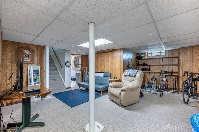 54 Beverly Pl, Oakwood, OH 45419 - exercise room featuring wood walls, carpet flooring, and a drop ceiling