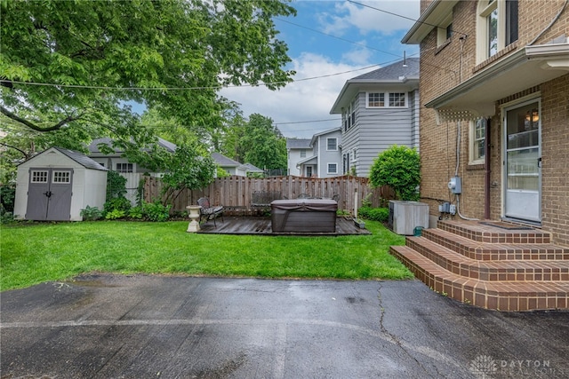 54 Beverly Pl, Oakwood, OH 45419 - view of yard featuring a hot tub, a patio area, and a deck