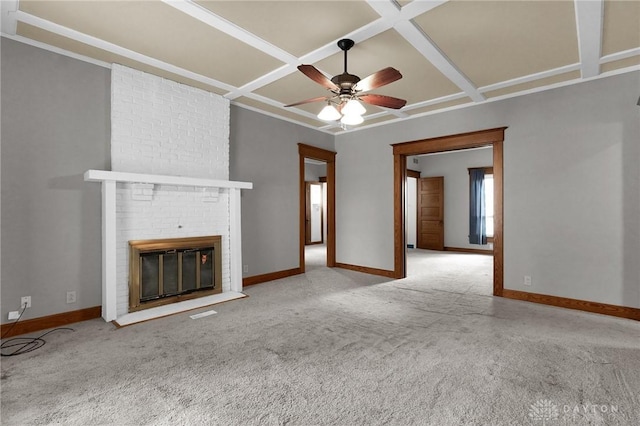 125 W Mound St, South Charleston, OH 45368 - unfurnished living room with coffered ceiling, baseboards, carpet flooring, a fireplace, and ceiling fan