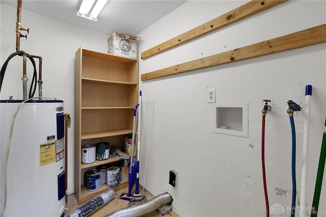 125 W Mound St, South Charleston, OH 45368 - laundry room featuring electric water heater and hookup for a washing machine