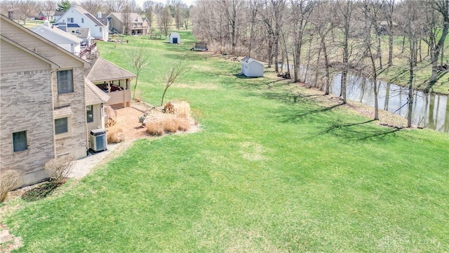 343 White Oak Dr, Chester Twp, OH 45177 - view of green lawn with a water view and central AC