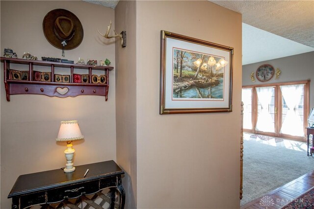 343 White Oak Dr, Chester Twp, OH 45177 - corridor with a textured ceiling and wood finished floors
