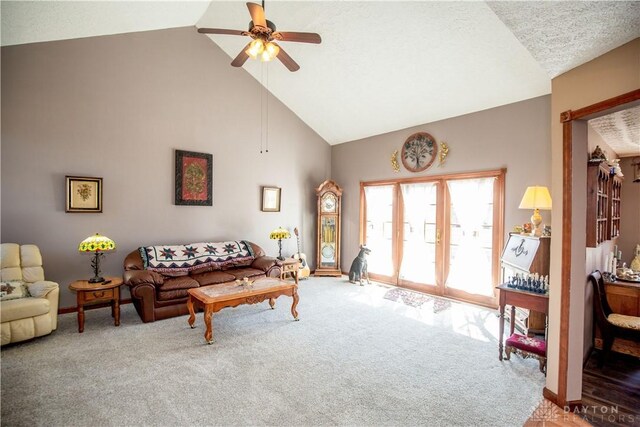 343 White Oak Dr, Chester Twp, OH 45177 - carpeted living room with high vaulted ceiling and a ceiling fan