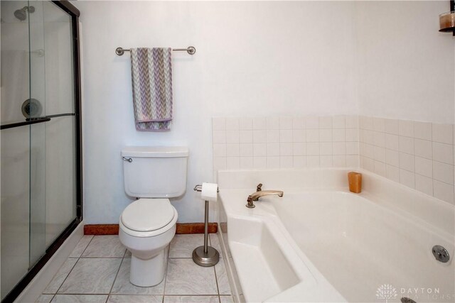 343 White Oak Dr, Chester Twp, OH 45177 - bathroom with a garden tub, toilet, a stall shower, baseboards, and tile patterned flooring