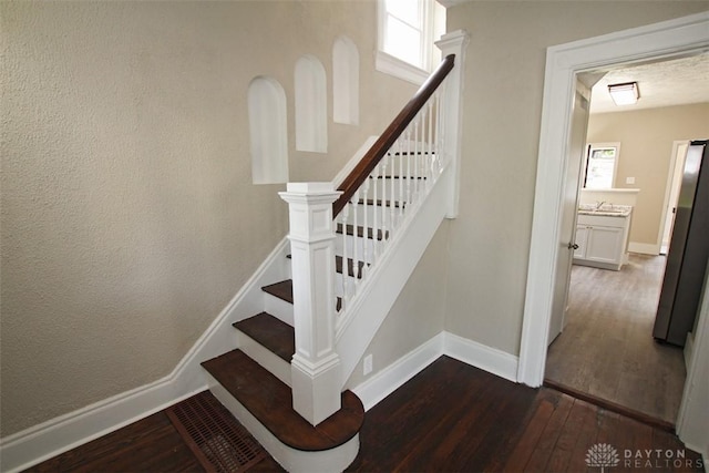 1716 Xenia Ave, Dayton, OH 45410 - stairway with hardwood / wood-style floors and baseboards