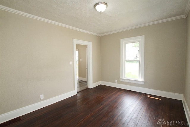 1716 Xenia Ave, Dayton, OH 45410 - empty room with dark wood-style floors, baseboards, ornamental molding, and a textured ceiling