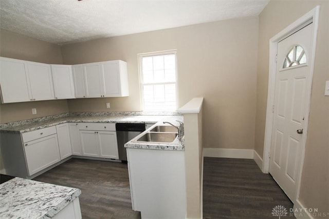 1716 Xenia Ave, Dayton, OH 45410 - kitchen with dishwasher, a sink, dark wood-type flooring, and plenty of natural light