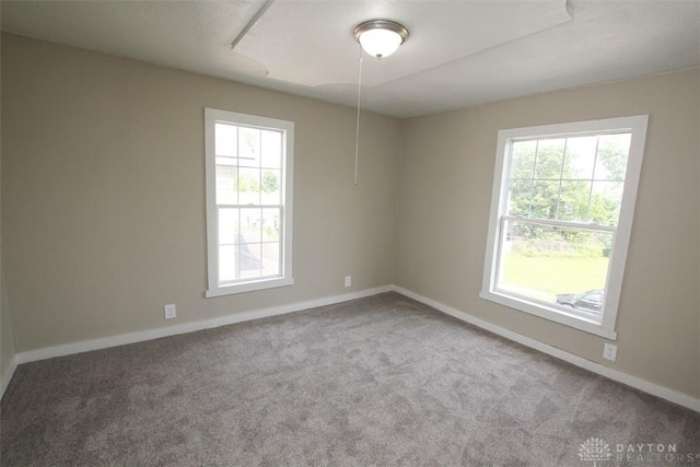 1716 Xenia Ave, Dayton, OH 45410 - carpeted spare room featuring baseboards