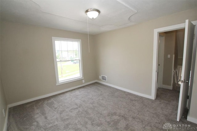 1716 Xenia Ave, Dayton, OH 45410 - carpeted spare room with baseboards